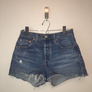 Levi’s high waisted cutoff jean shorts with a 25W.